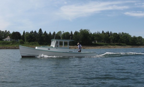 Powerboat BRENDA KAY moving at a semi-displacement speed