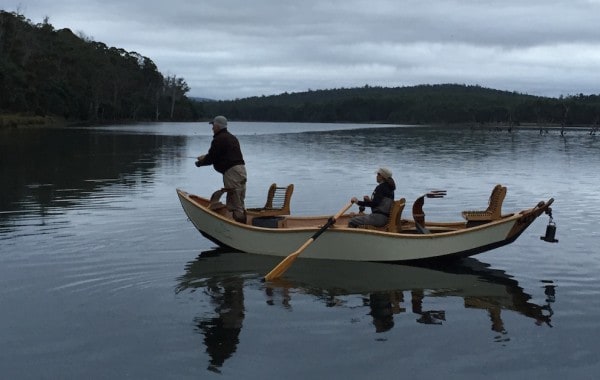 Fly fishing in Driftboats in the Tasmanian countryside.