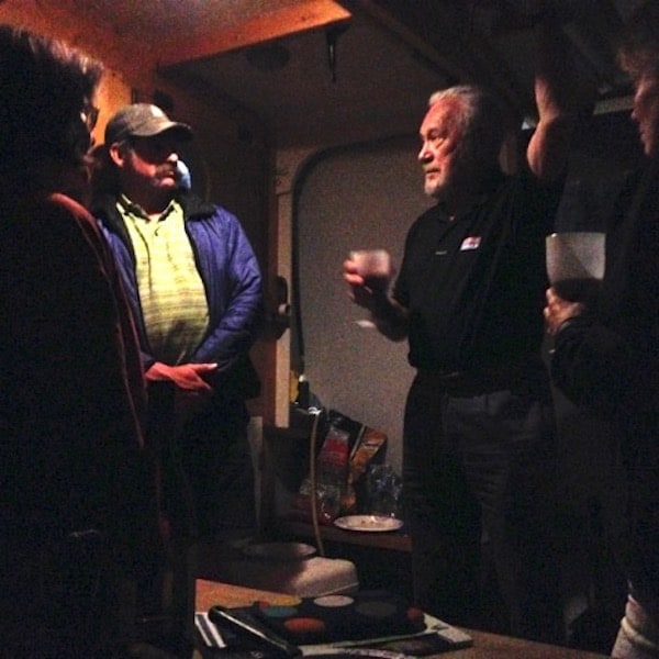 Will Sugg and others listening to Robin Knox-Johnston on the final night.