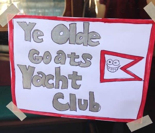 Ye Old Goats Yacht Club - A sign stuck in RAVEN's window.